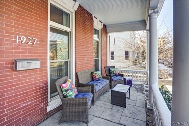 Renovated front porch to include stamped concrete floor, new ceiling and new roof