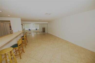 Note the sliding glass doors that separate the fam