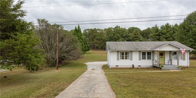 VIEW FROM STREET LOOKING TOWARDS BACK OF PROPERTY