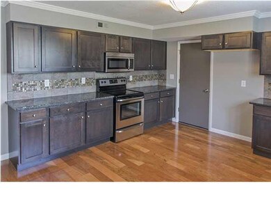 New stainless steel appliances, tiled backsplash a