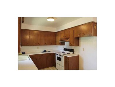 Kitchen. Ample cupboards in large kitchen