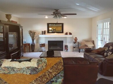 This gorgeous Family Room is open to the breakfast