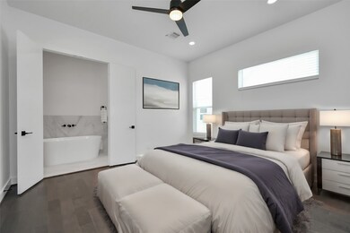 Retreat to luxury in this expansive primary bedroo