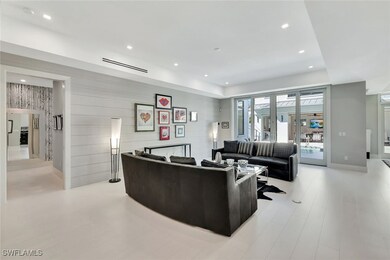 Living room with light hardwood / wood-style floors