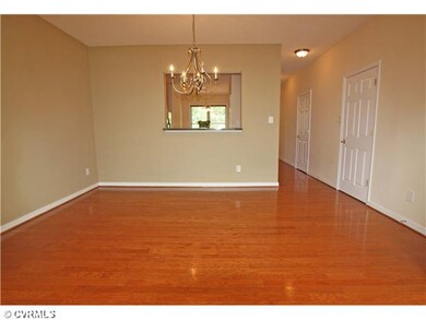 Dining Room - Formal dining area with wood floor o