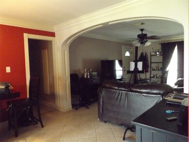 Beautiful woodwork that separates Living and Breakfast areas.