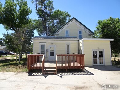 deck and studio on rear