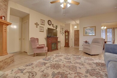 This view shows off the spaciousness of the family room and it is adjacent to the formal dining area for ease of entertaining.