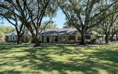 Mature trees and 19 zone sprinkler system.