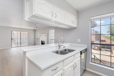 Kitchen featuring stainless steel dishwasher, a pe