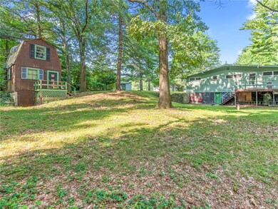 Home is set on a 1/2 acre wooded lot