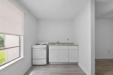 This photo shows a bright, minimal space with whit