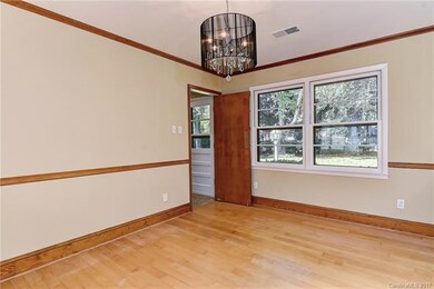 Another view of the dining room and door to the ki