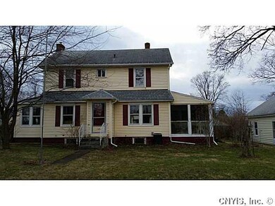 Exterior Front. A beautiful sun porch AND a huge s