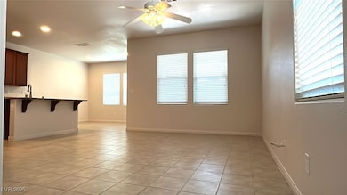 Unfurnished living room with light tile patterned