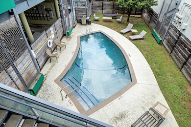 Pool featuring a fenced backyard, a patio, and a 