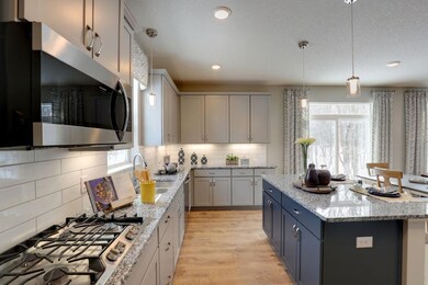 This new kitchen features granite kitchen countert