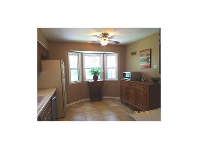 Kitchen with tons of Natural Light and Ceiling fan
