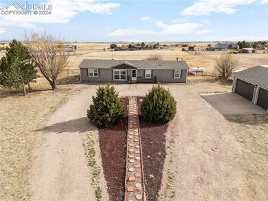 17555 Wagon Train Loop, Peyton, CO 80831 - photo 5