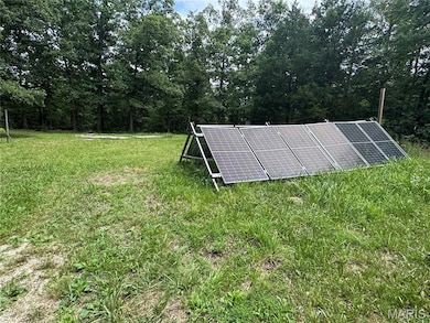View of yard and Solar panels