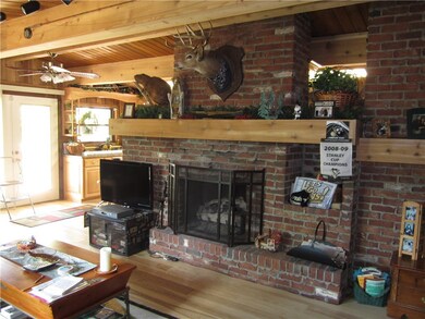 FIREPLACE IN LIVINGROOM IS GAS BURNING WHILE THE O