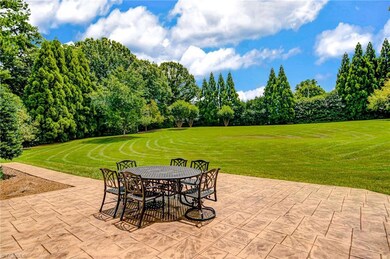 Enjoy outdoor dining on you gorgeous stamped concrete patio.