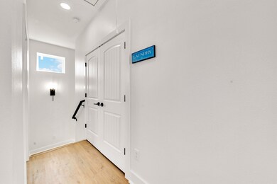 As you step inside, the entryway welcomes you with
