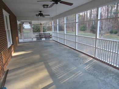 Unwind on the lovely screened porch