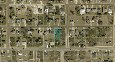 Aerial overview of property's location featuring property parcel outlined