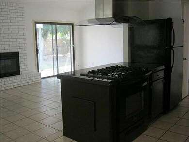 Kitchen with view of living/family room.