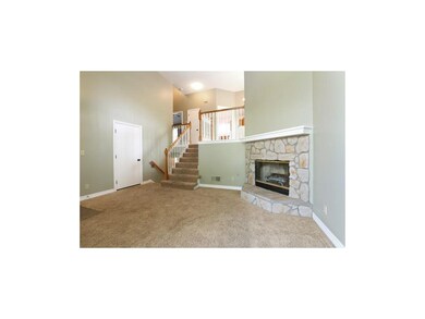 Great Room with stone fireplace.