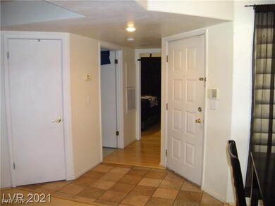 Tile & Wood laminate floors greet you at the front