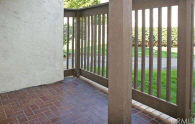 Cozy Brick Courtyard in the front