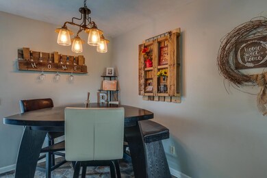 Dining Area..seller made the cute rustic decor above dining table...cute, huh?