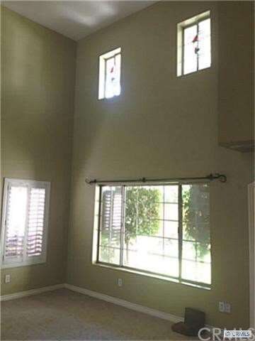 Lots of light from lots of windows in living room 