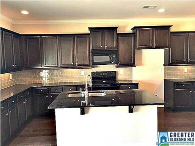 Island overlooks family room