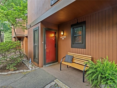 Cozy entry and plenty of parking nearby