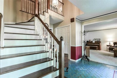 Beautiful entryway and custom features in this lov