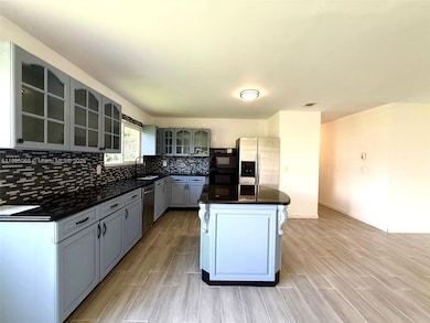 3311 SW Ensley Ct, Port Saint Lucie, FL 34953 - photo 5