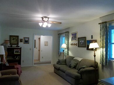 Other Living room looking back to front entry
