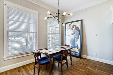 Breakfast area with designer light fixture.