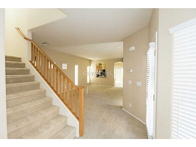 Property Photo. stairs off entry way