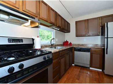Kitchen. Stainless appliances, hardwood floors and