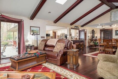 Sliding glass door leads out to large courtyard/pa