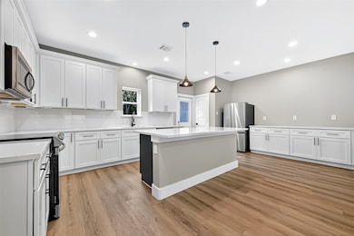 Whether you love to cook or just love good aesthetics, this kitchen checks every box with clean lines, open sightlines, and plenty of prep space.