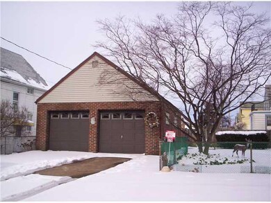Yard/Garden. Two car garage and fenced-in yard.