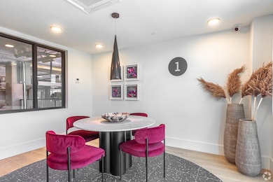 Dining space with recessed lighting, light wood-type flooring, and cooling unit