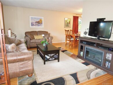 Living room is open to the dining room, ideal for 