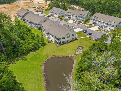 Unit 101 is the bottom unit with a pond view.