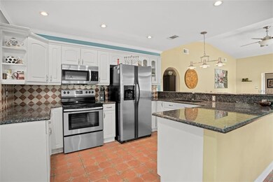 Updated kitchen with stainless appliances.